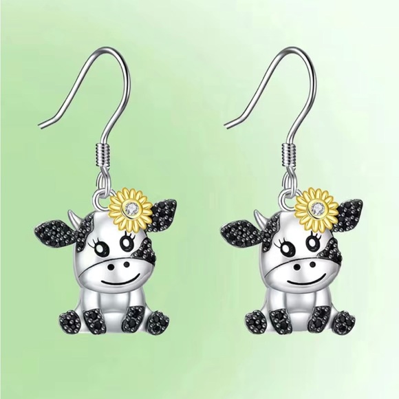 Other - Little Silver cow earrings with a daisy